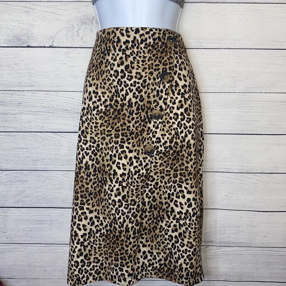 Soho Apparel Dresses & Skirts - Soho cheetah print w/ asymmetrical faux buttoned hem line midi pencil skirt